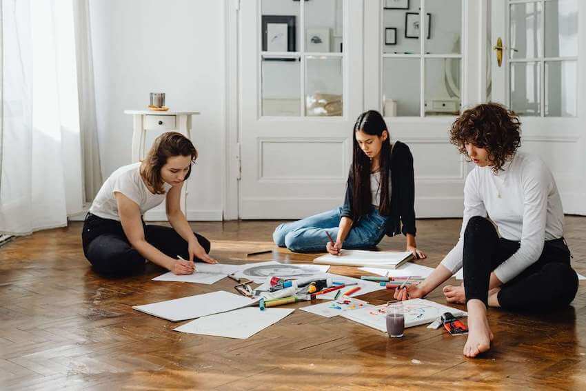 3 women enjoying arts and crafts