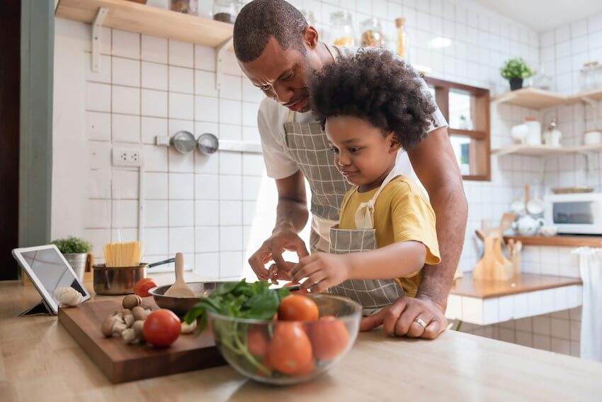 dad cooking a recipe with his toddler