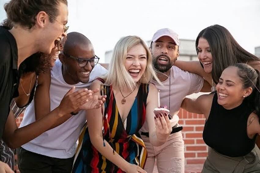 diverse group of friends laughing