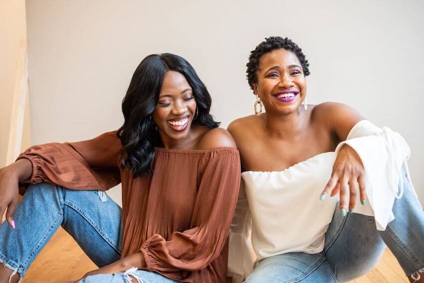 two friends laughing together