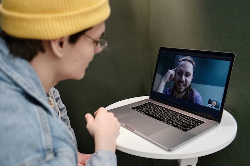 man on a video call with a friend