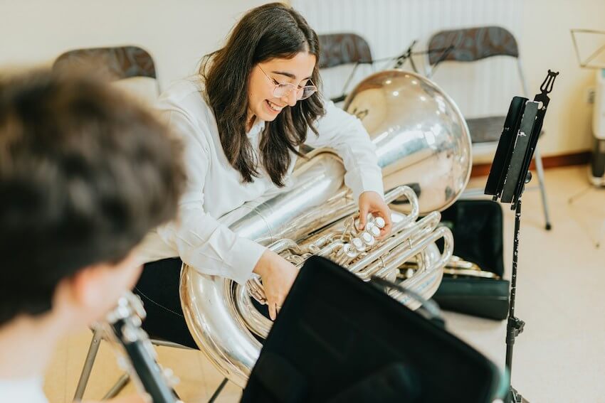 smiling female tuba player