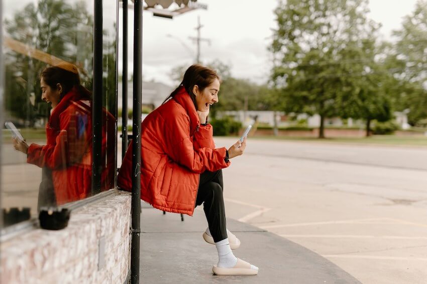 smiling woman on a video call with a loved one