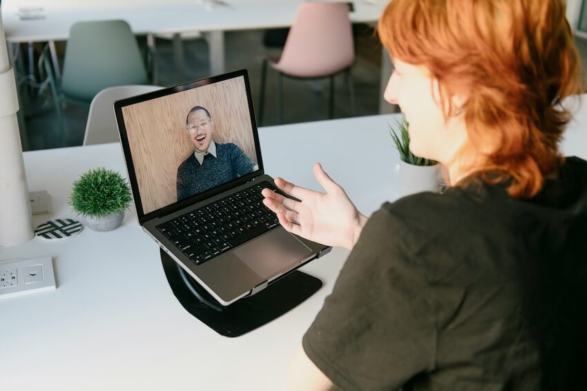smiling woman on a video conference call