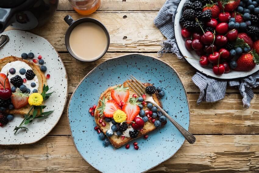 healthy breakfast including whole grain toast and fruit