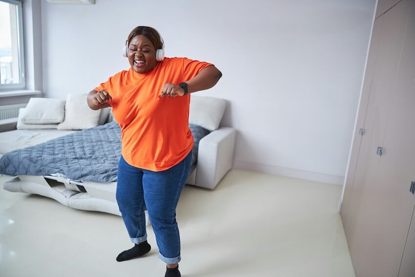 woman dancing at home