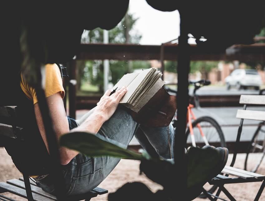 woman journaling outside