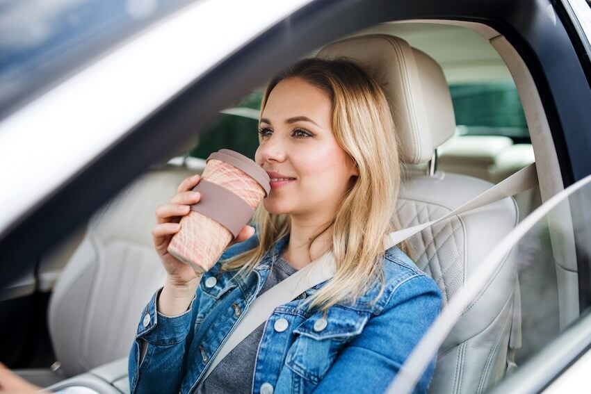 woman savoring her cup of coffee