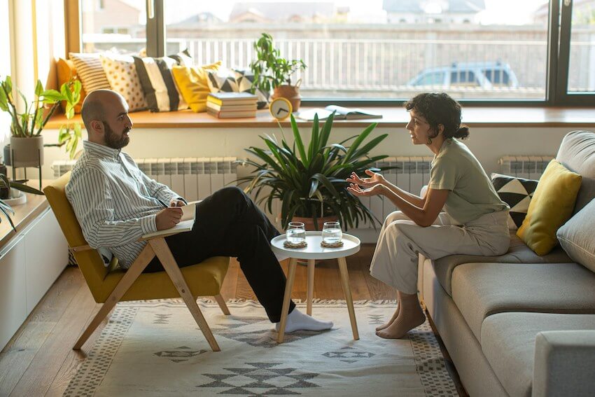 woman talking with a mental health professional