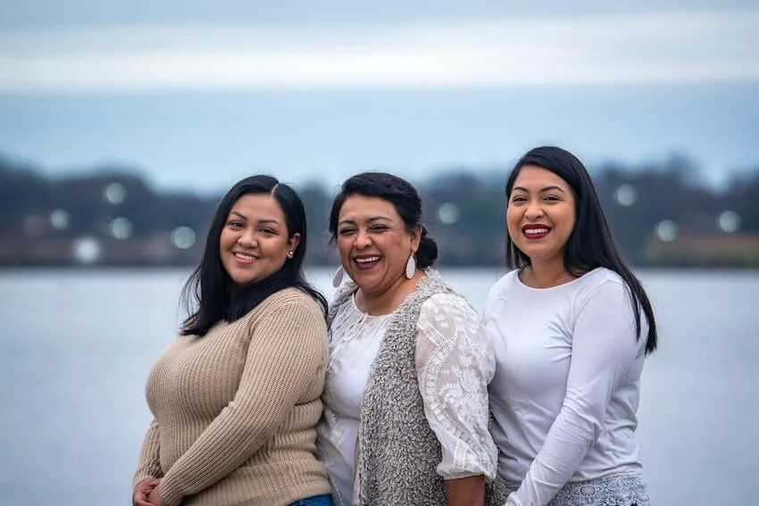 two sisters with their mom