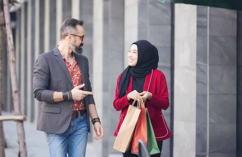 man giving a woman a compliment