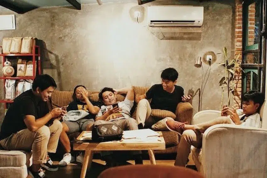 group of friends relaxing at home