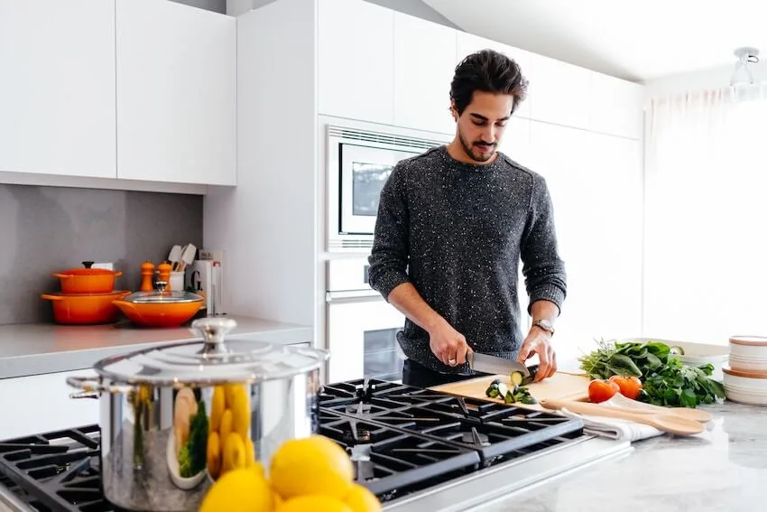 man cooking dinner