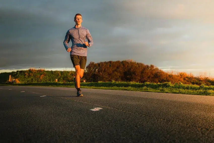 man running outside during the day