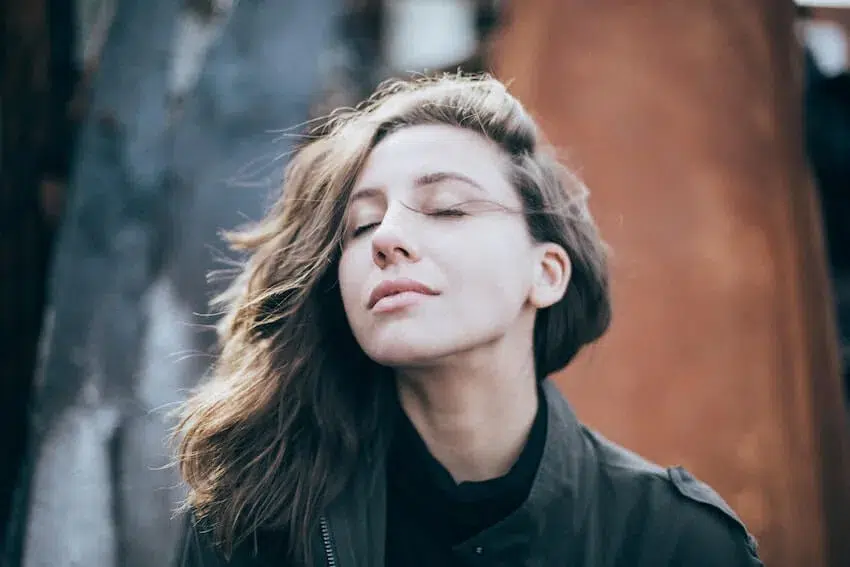 woman meditating outside