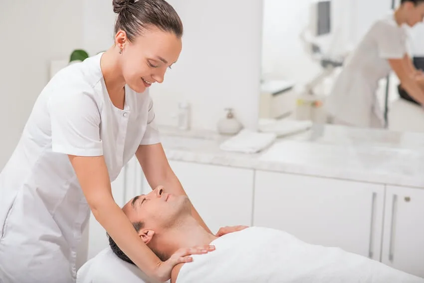 man receiving a shoulder massage