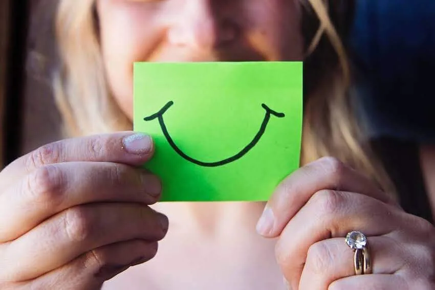 smile on a green post-it note