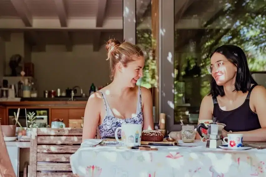 two women enjoying a meal at a restaurant