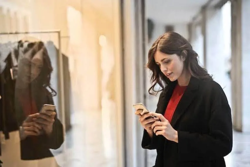 distracted woman staring at her phone