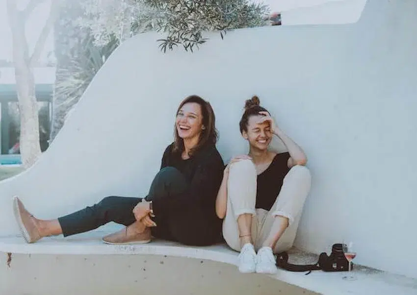 two female friends laughing