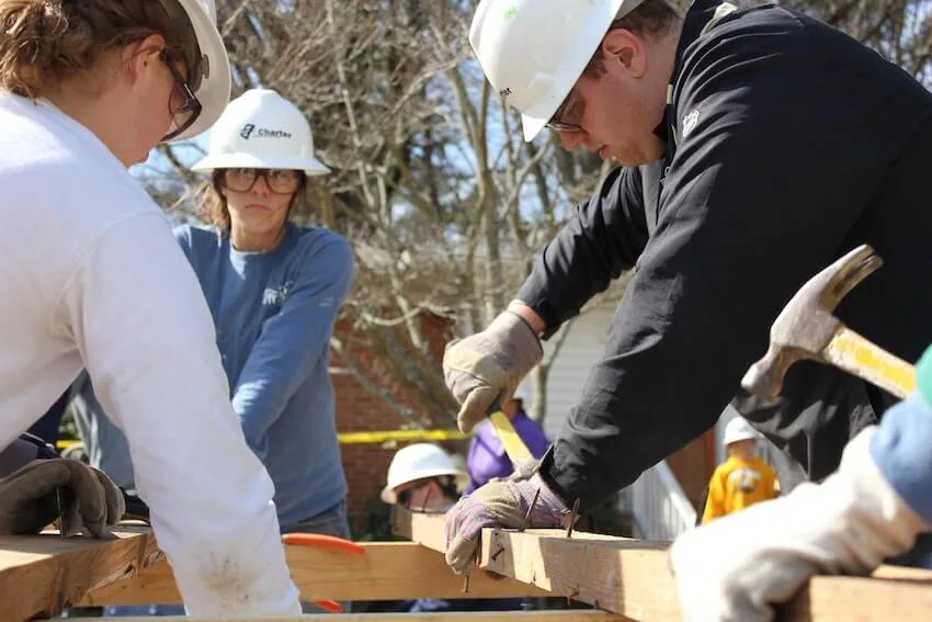 Habitat for Humanity volunteers building a house